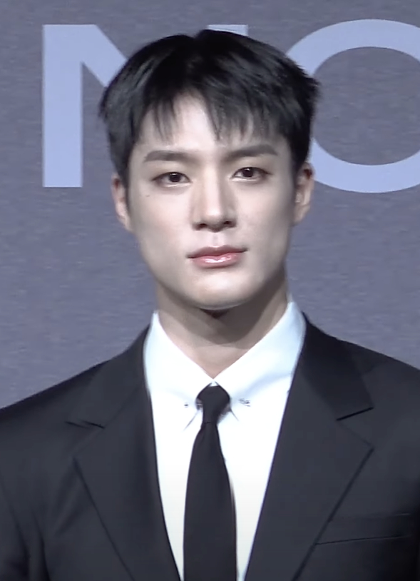 Jeno NCT dalam konferensi pers album DREAM()SCAPE